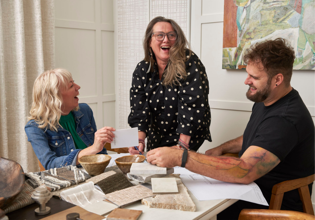 Couple discussing design ideas with an interior designer.
